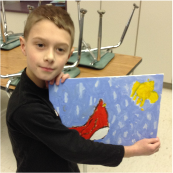 4th grade student with a painting
